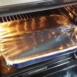 Krmenadle u sosu od crnog luka | Pečenje u rerni i dodavanje krompira | Postupak 5 | Slika 1/6