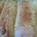 Pita sa grizom i limunom | Dodavanje preliva | Postupak 5 | Slika 4/4