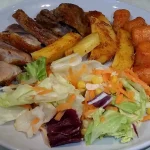 Svinjska kolenica sa povrćem iz rerne | Serviranje  | Postupak 6 | Slika 4/5