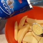 Svinjska kolenica sa povrćem iz rerne | priprema krompira | Postupak 3 | Slika 4/7